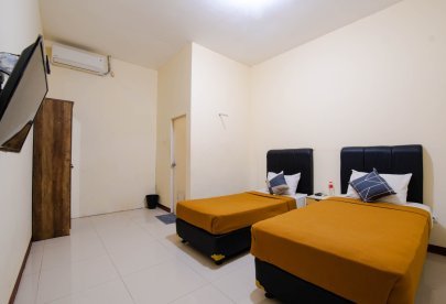 Kost Harian, Mingguan, & Bulanan Athena Syariah Twin Bed Dekat Ke Lapangan Ahmad Yani Tangerang