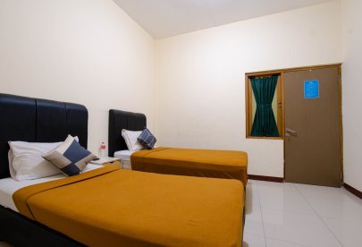 Kost Harian, Mingguan, & Bulanan Athena Syariah Twin Bed Dekat Ke Lapangan Ahmad Yani Tangerang